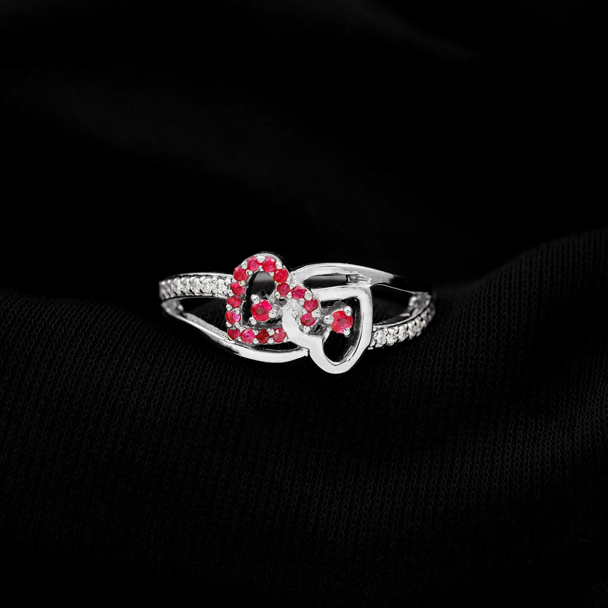 0.25 CT Interlock Heart Ring with Ruby and Moissanite in Gold